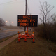 Image for article titled Jalopnik-Hacked Road Sign: We're All Going To Jail Now